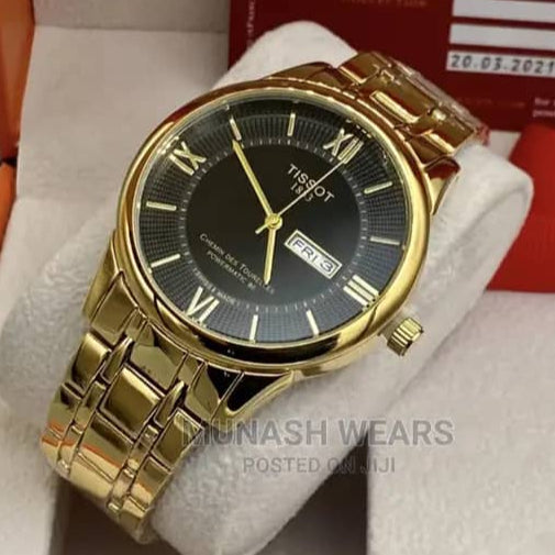 Montre Tissot (Ref MM044 bracelet en Acier doré)